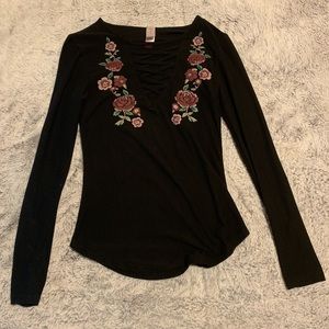 Black long sleeve top with lace and strap in front